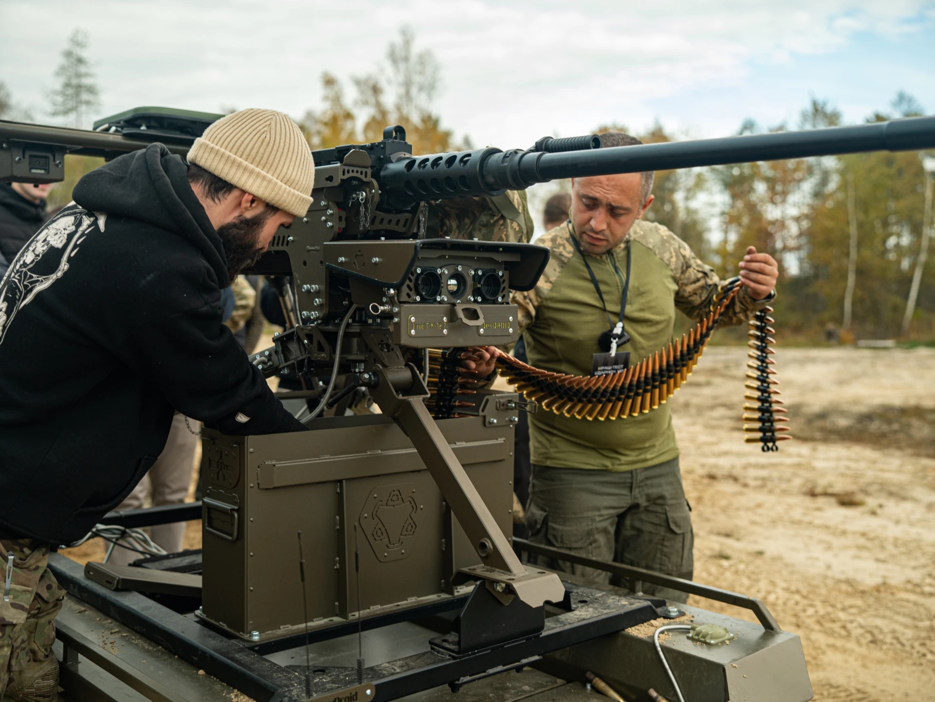 Manufacturers check the UGVs before testing / Photo courtesy of the organizers Manufacturers check the UGVs before testing / Photo courtesy of the organizers
