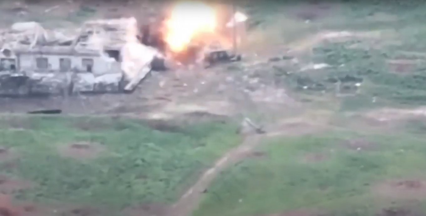 Explosion of an artillery shell near the Russian BMP